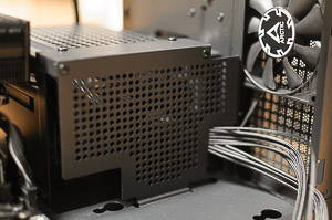 "Close-up of the top 80mm Arctic fan and GPU power cables"