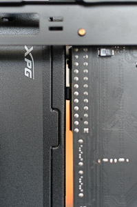 "Full-size ATX PSU touching the motherboard's 24-pin power connector"